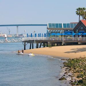Coronado Ferry Landing Shops with bay bridge in distance
